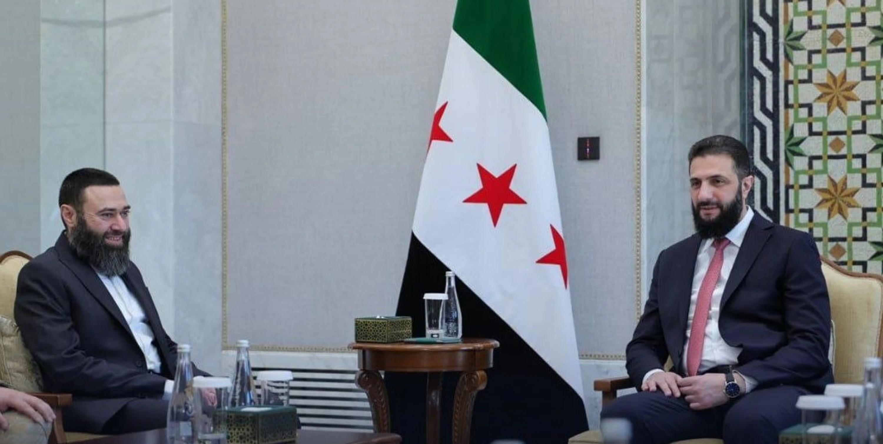 Image of Sharaa receives former Syrian rebel leader freed from UAE detention