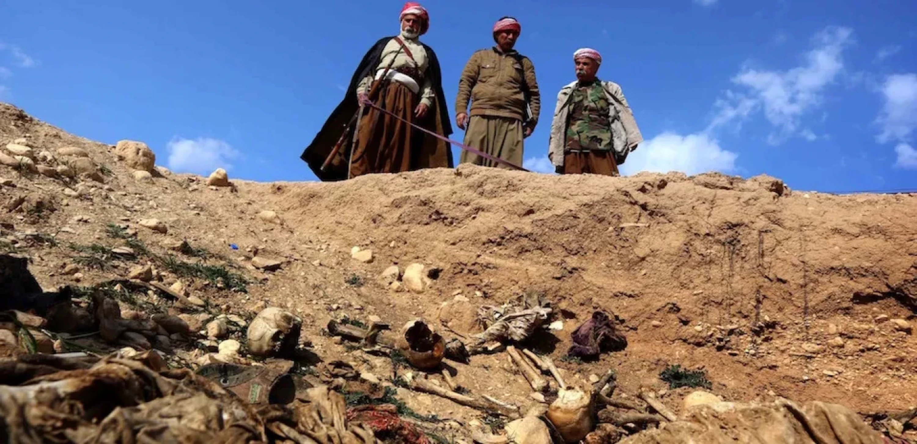 Image of Yazidi mass grave with nearly 70 remains to be exhumed in Sinjar: Official
