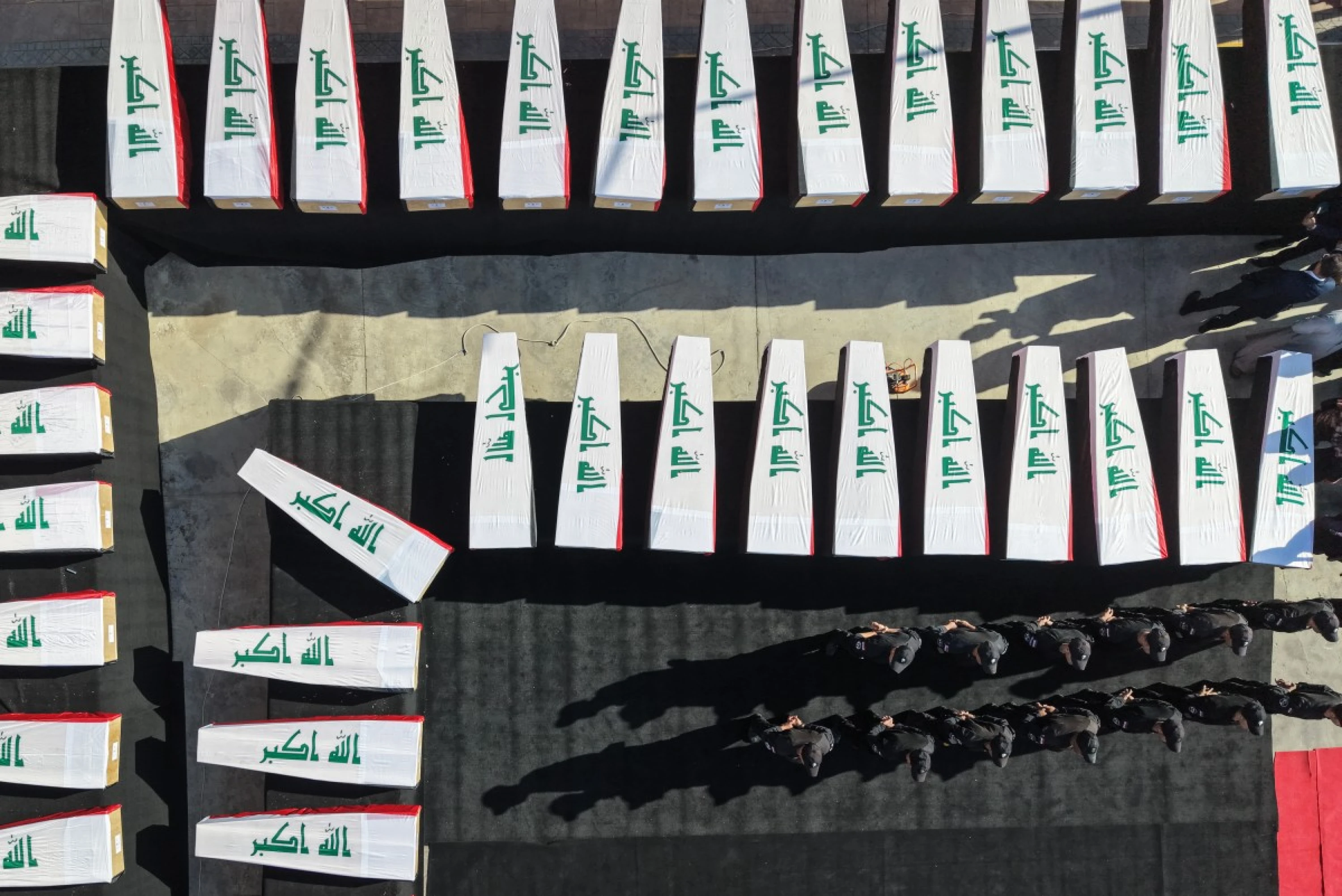 Image of Iraq buries almost 50 security forces killed by ISIS in Mosul
