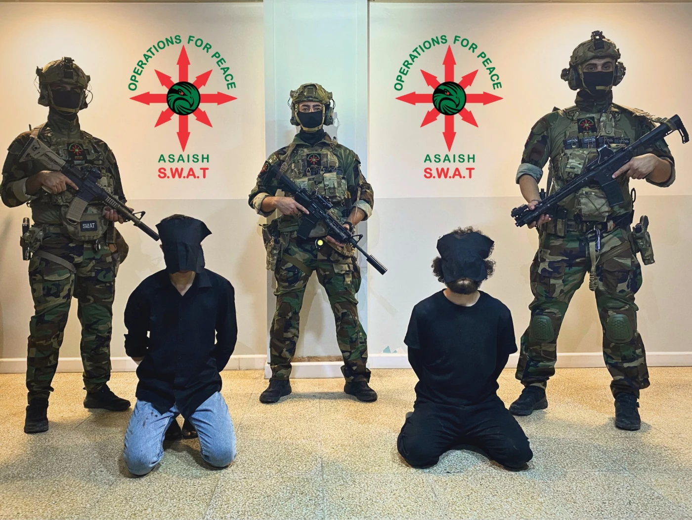Image of Sulaimani police building shot, two suspects arrested