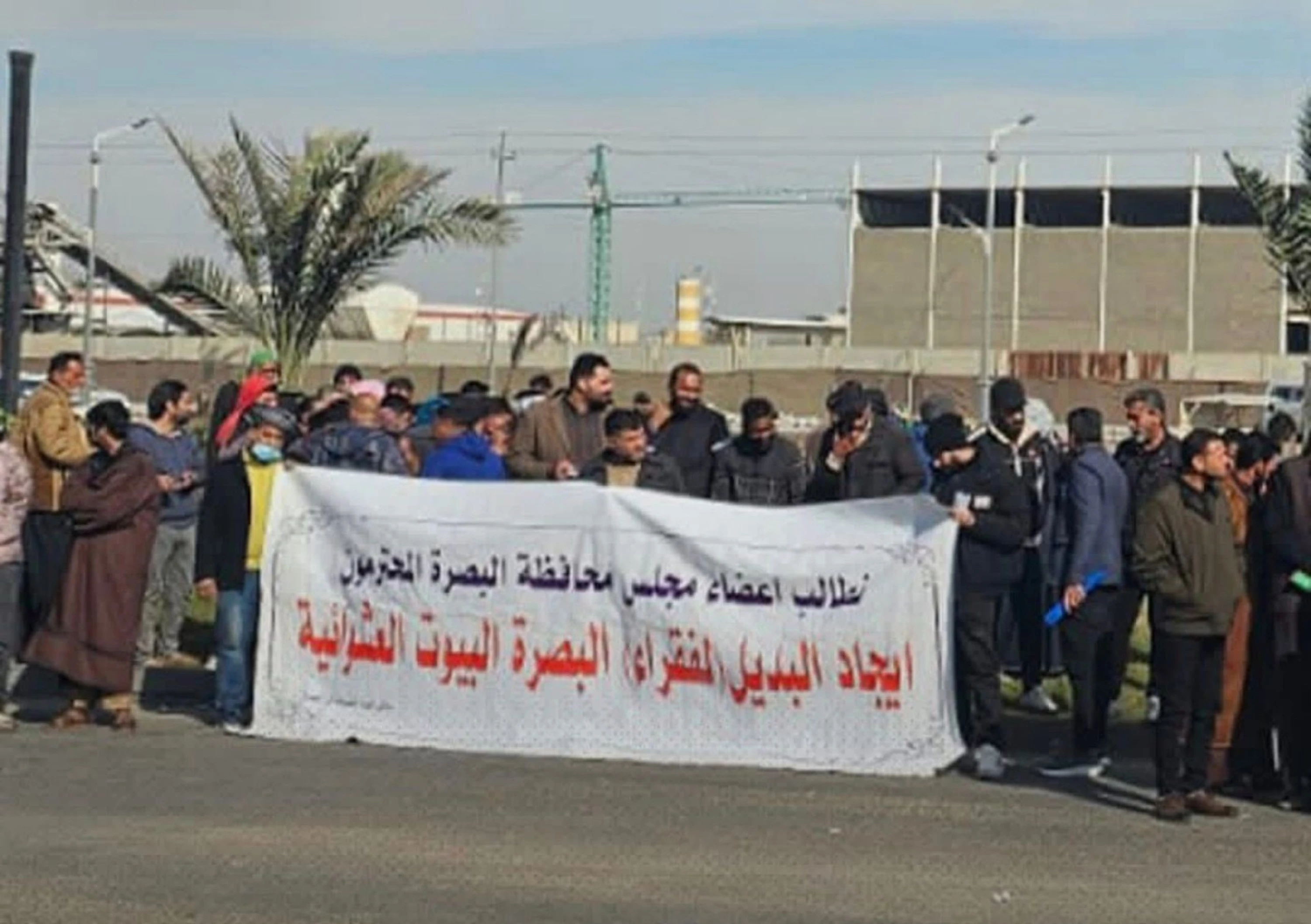Image of Basra residents protest planned demolitions of informal housing units 