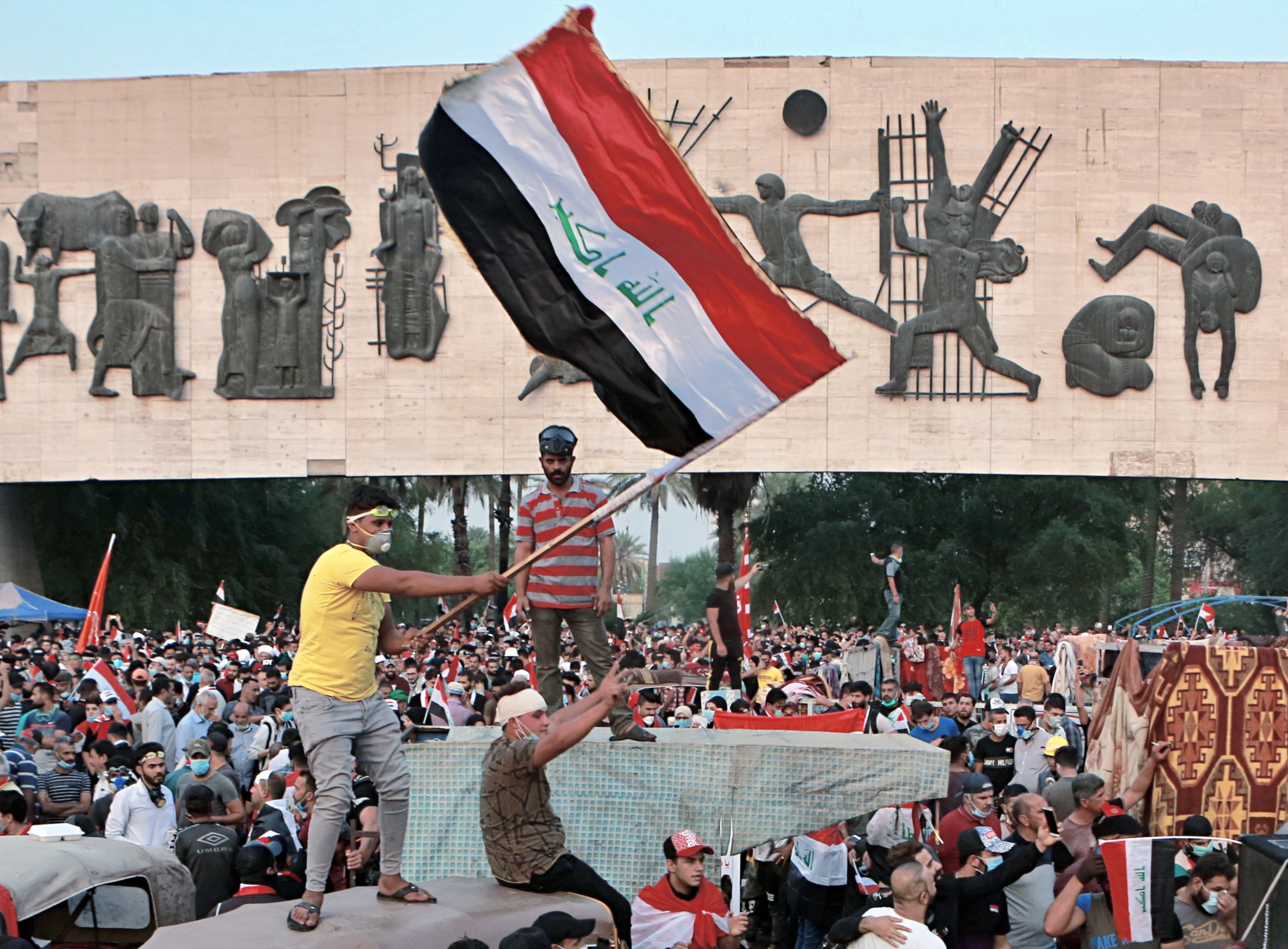 Image of Tishreen lawmakers shift toward traditional parties in Iraq, raising questions about protest movement’s legacy