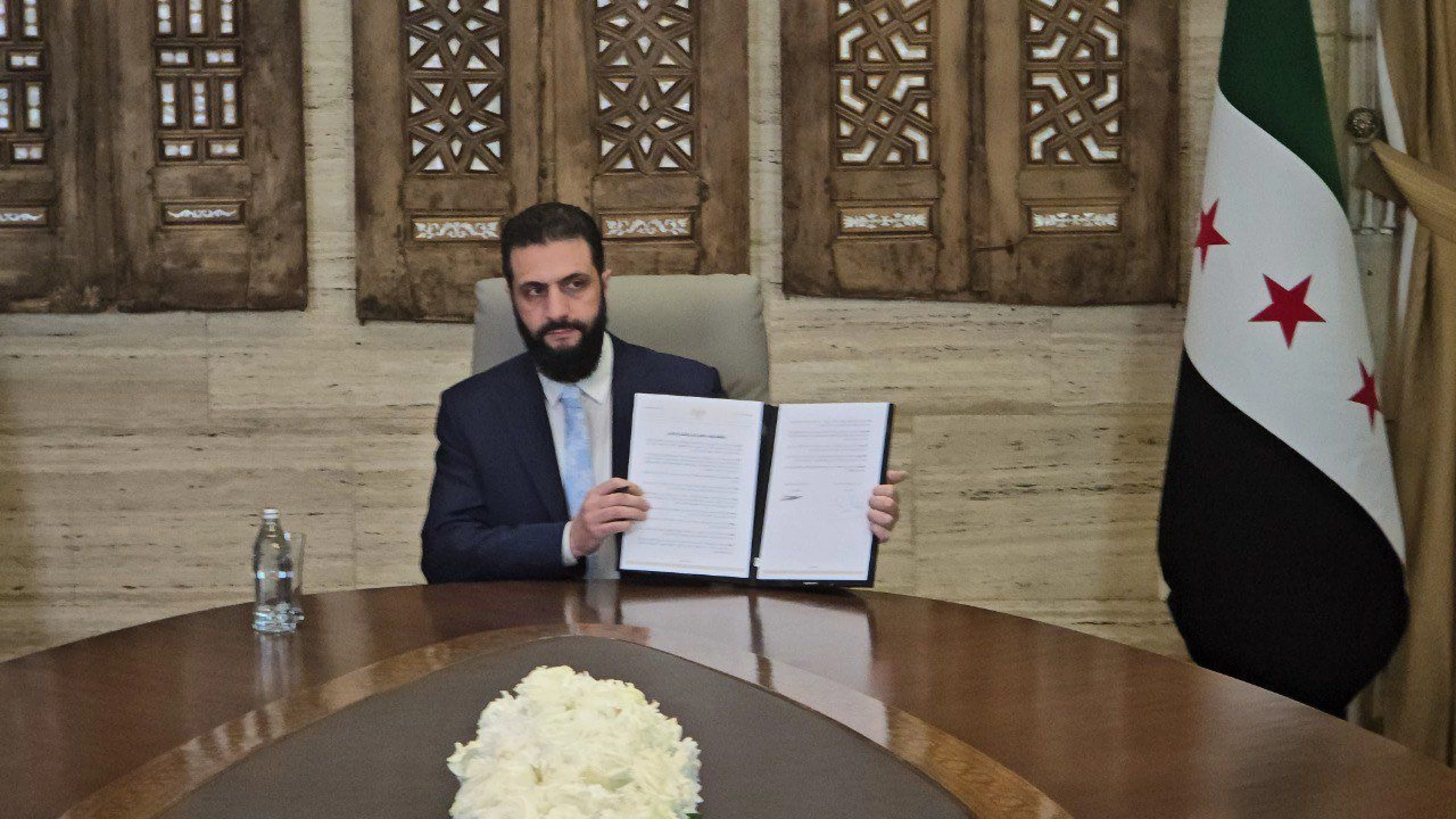 Image of Sharaa says reached agreement with SDF