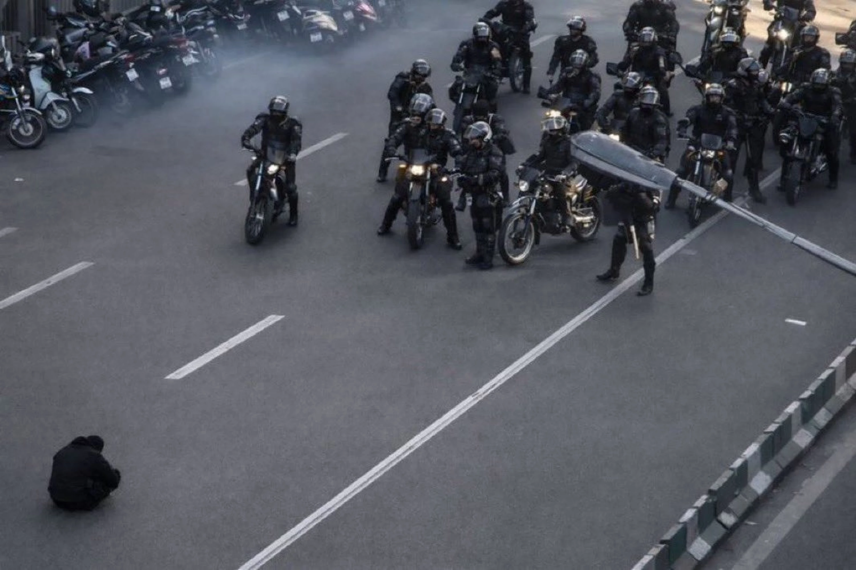 Image of Iran adopts softer approach as Tehran protests enter third day