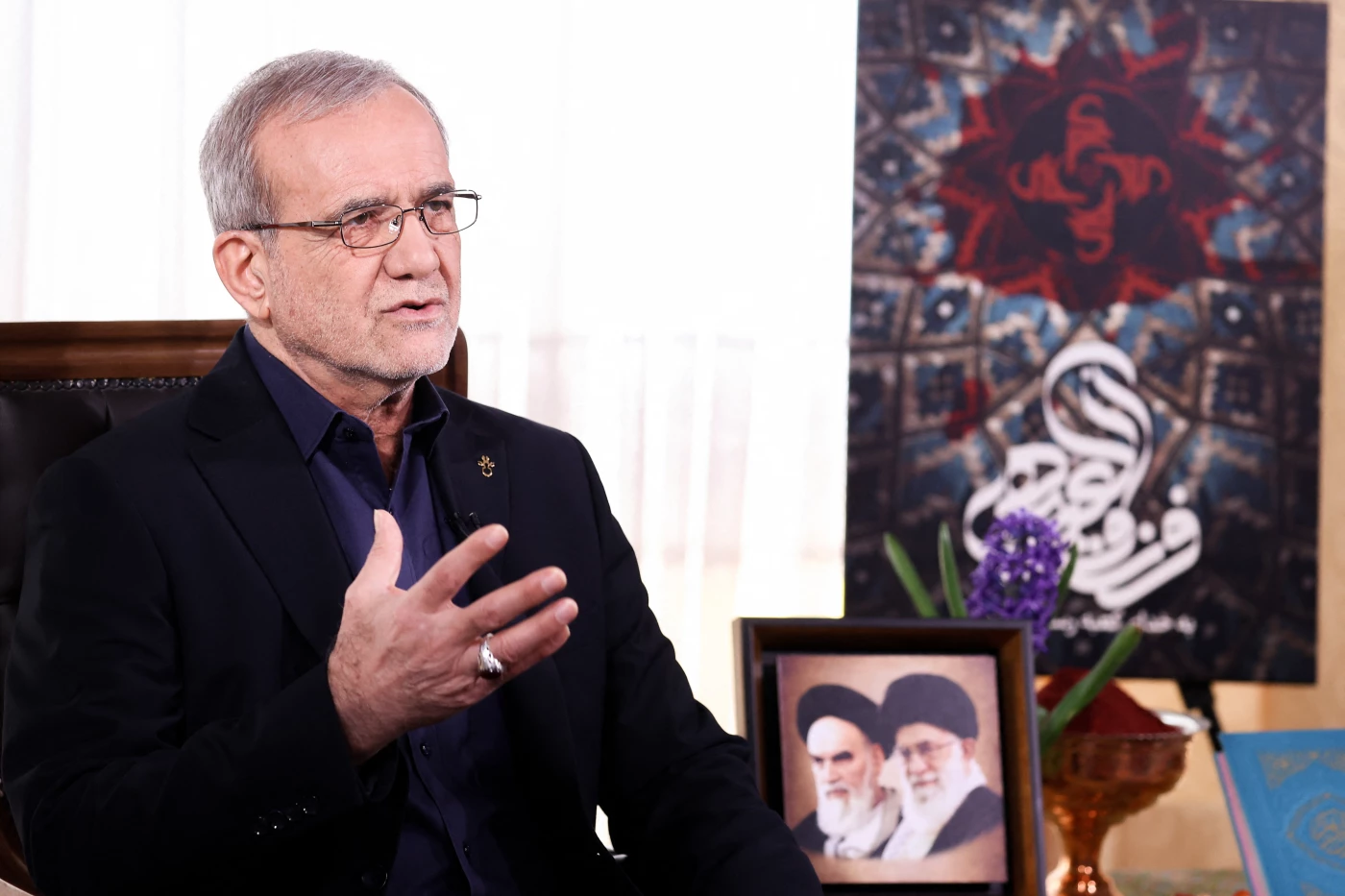 Image of Iranian president says ‘no problem’ in restarting nuclear talks, claims Israeli assassination attempt