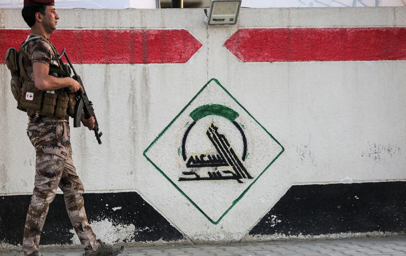 Image of Alleged PMF members attack agricultural ministry department in Baghdad